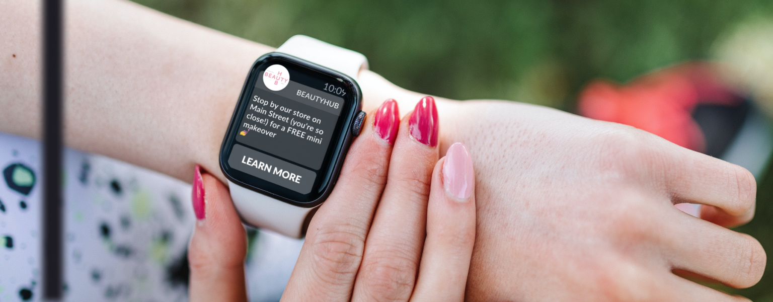 Location-based push messages via loyalty app, seen on a smartwatch